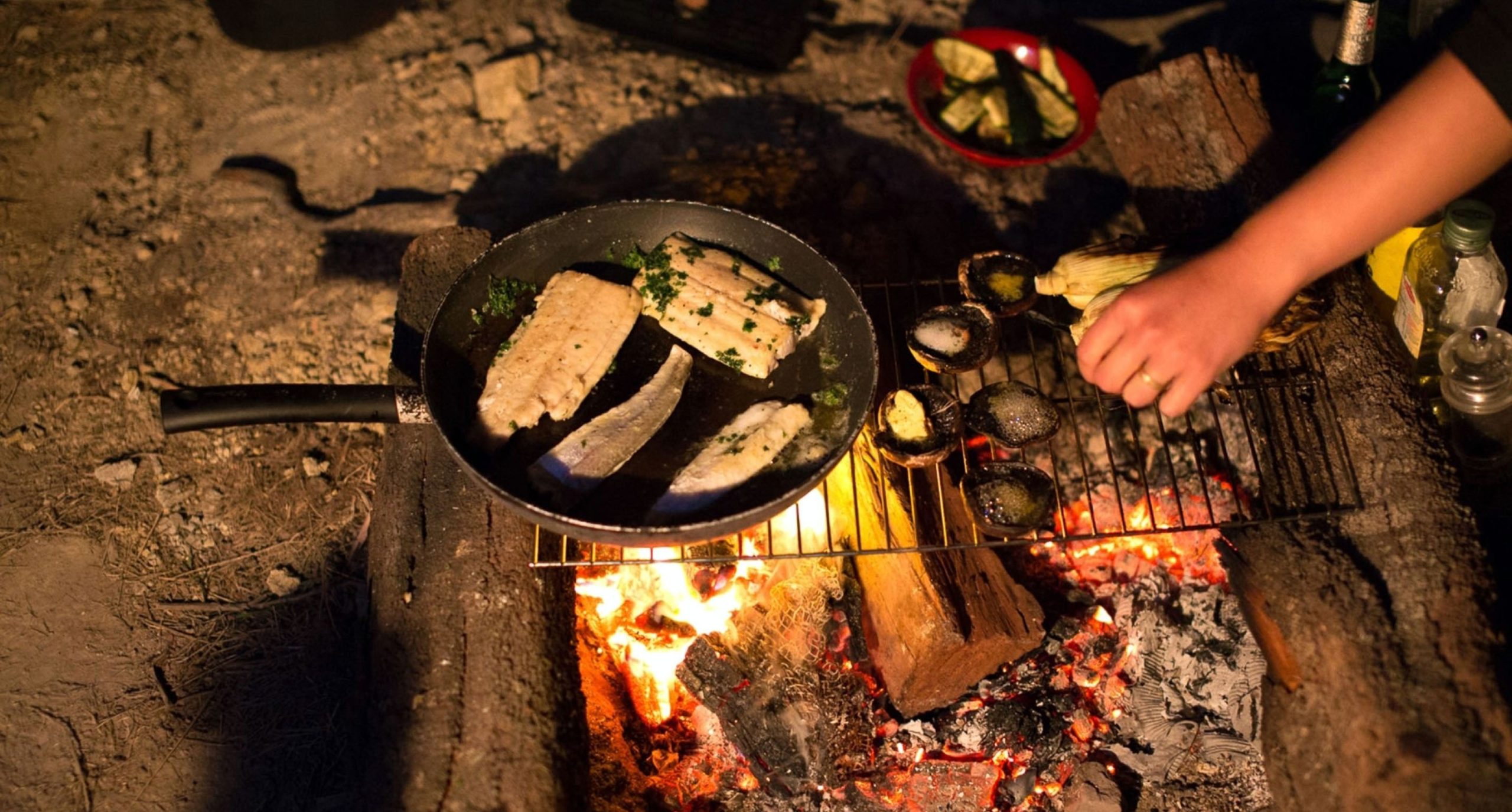 Cooking over campfire