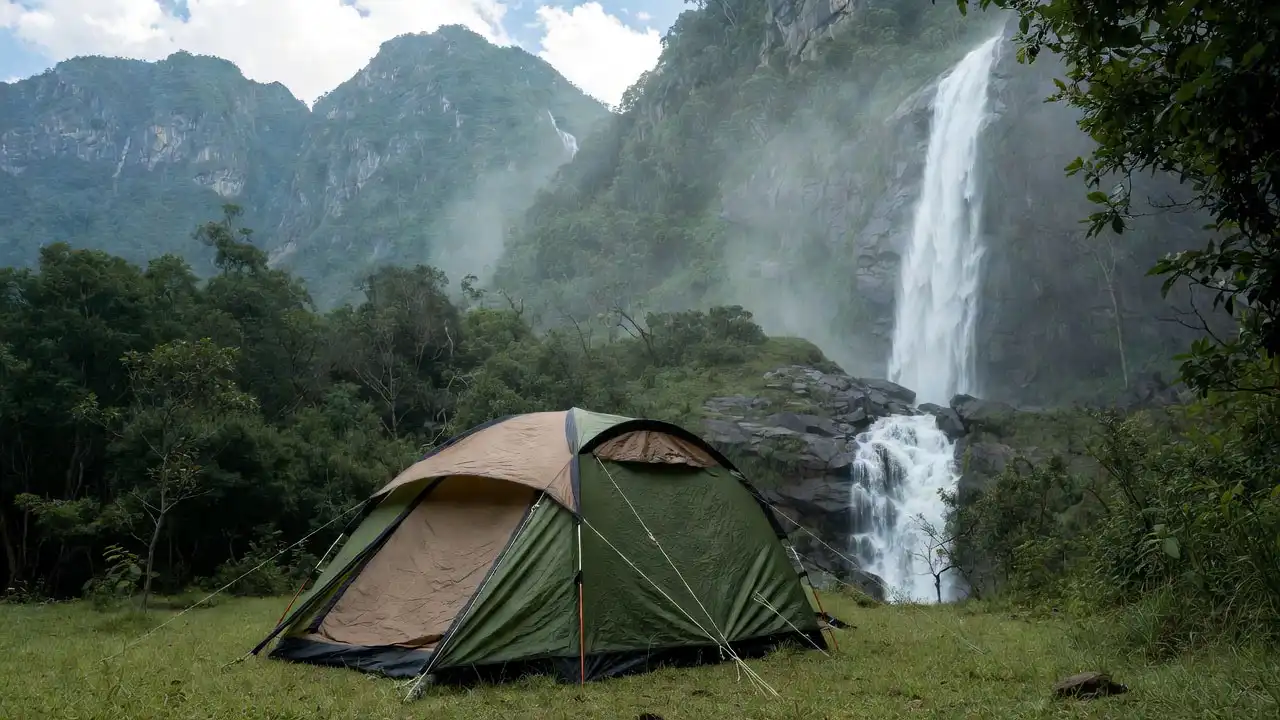 camping in the forest near a waterfall