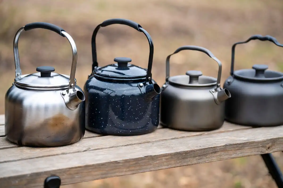 stainless enamel titanium and aluminum kettles side by side