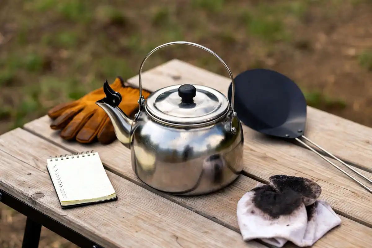 campfire kettle checklist with gloves and pot lifter