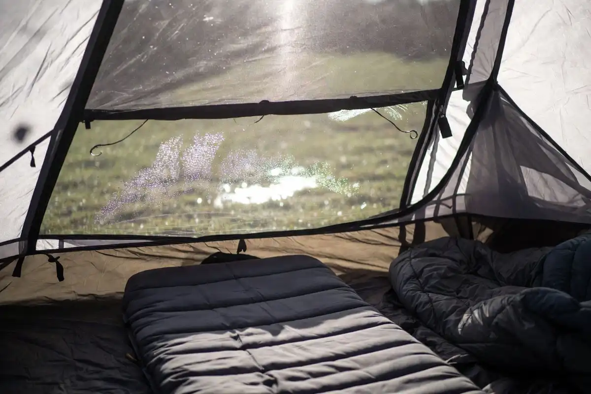 tent condensation and damp ground causing moisture near sleeping area