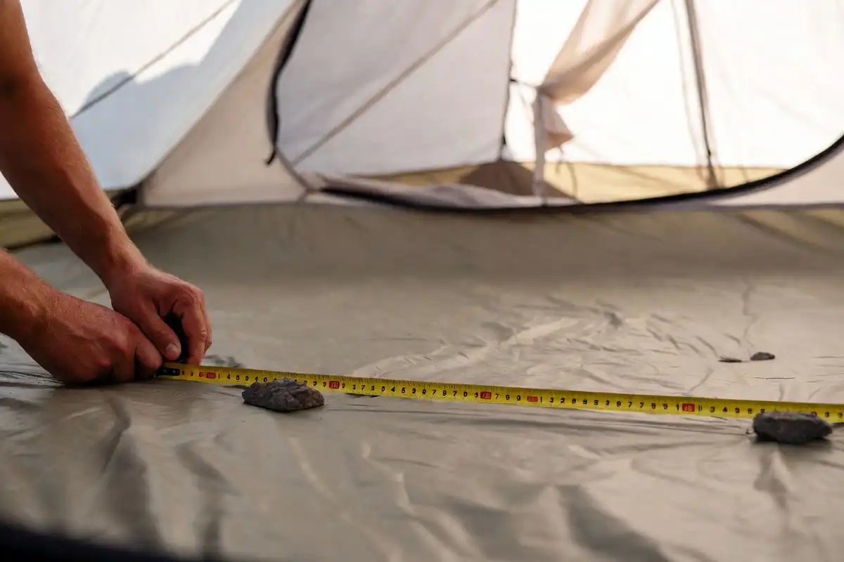measuring tent footprint with tape measure