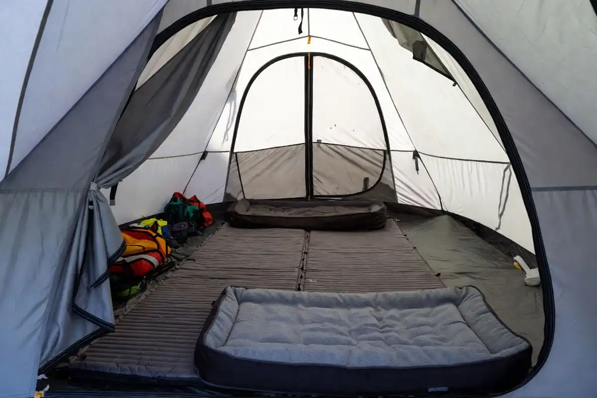 cabin tent layout with dog bed and gear space