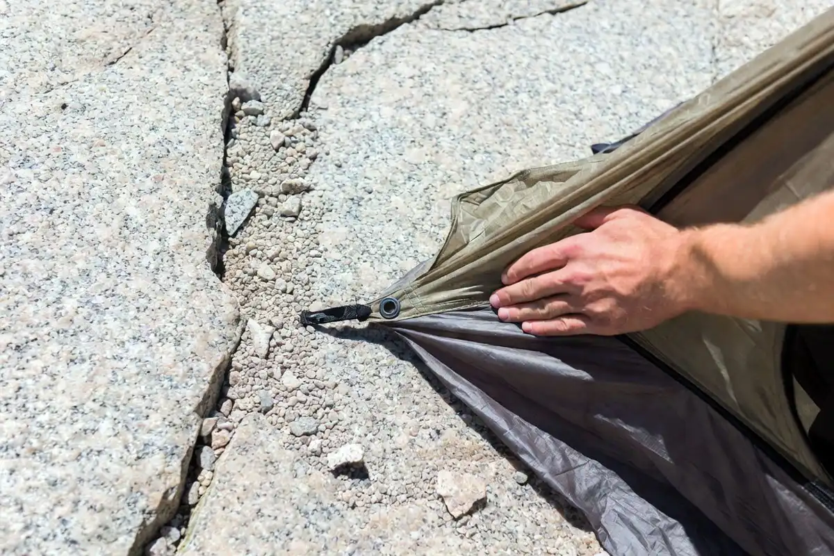 footprint protecting tent floor from sharp rock