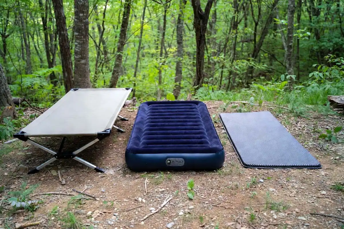 Camping cot air mattress and sleeping pad comparison outdoors