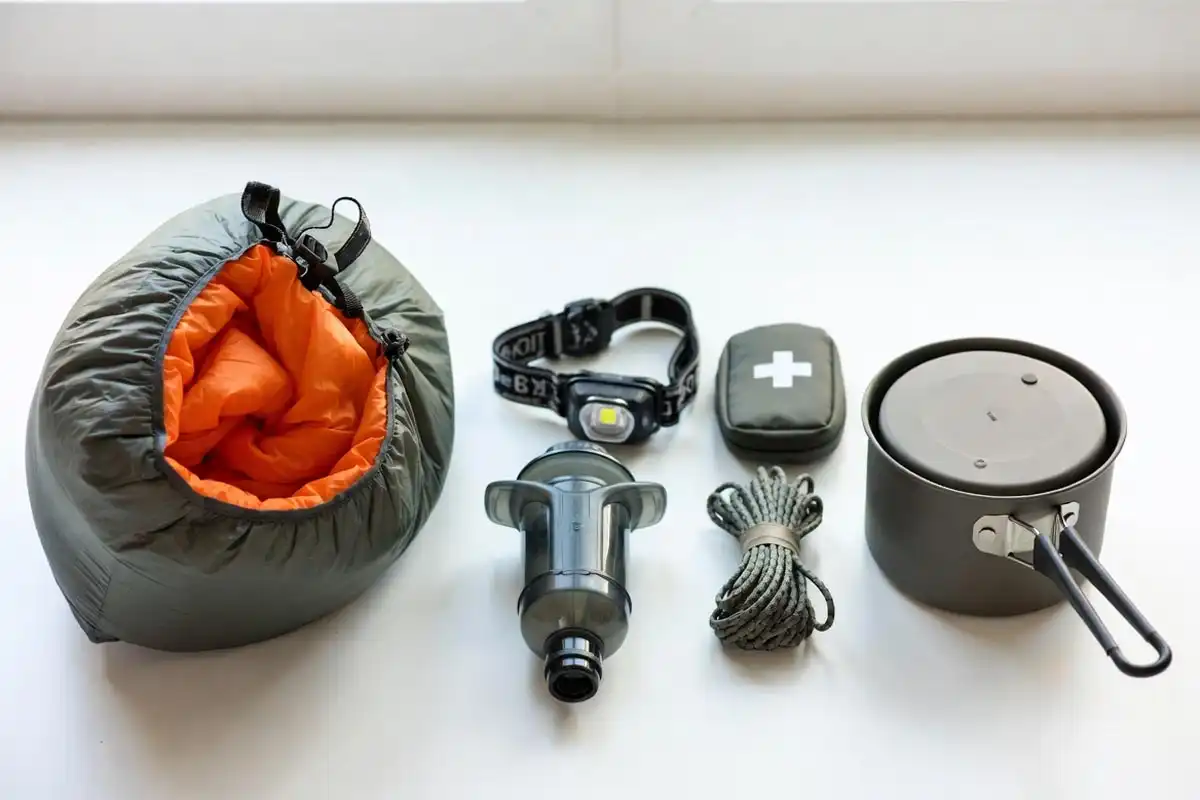 sleeping bag headlamp water filter and cookpot cleared for carry on