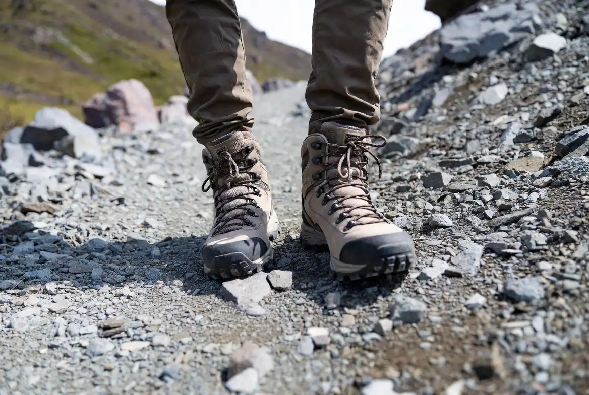 flat foot placement technique on steep rocky incline using hiking boots