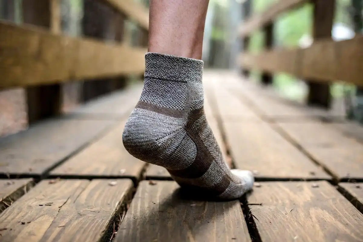 hiking sock heel cup sitting correctly aligned on foot arch