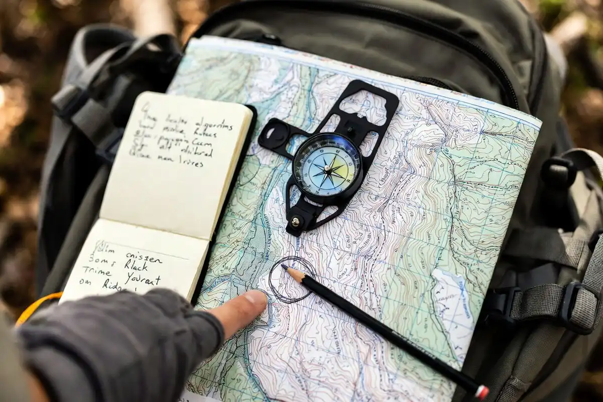 map and compass check at last known trail junction
