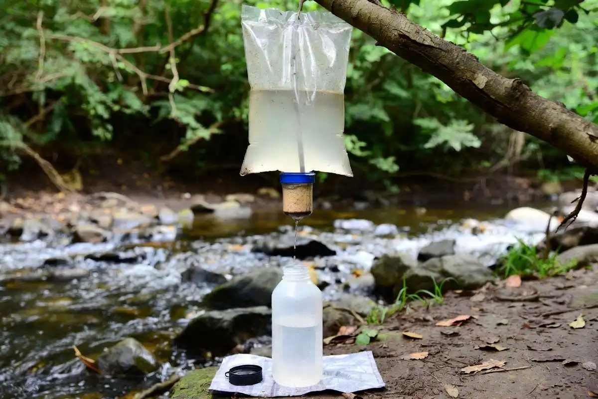 water filter setup separating dirty and clean containers