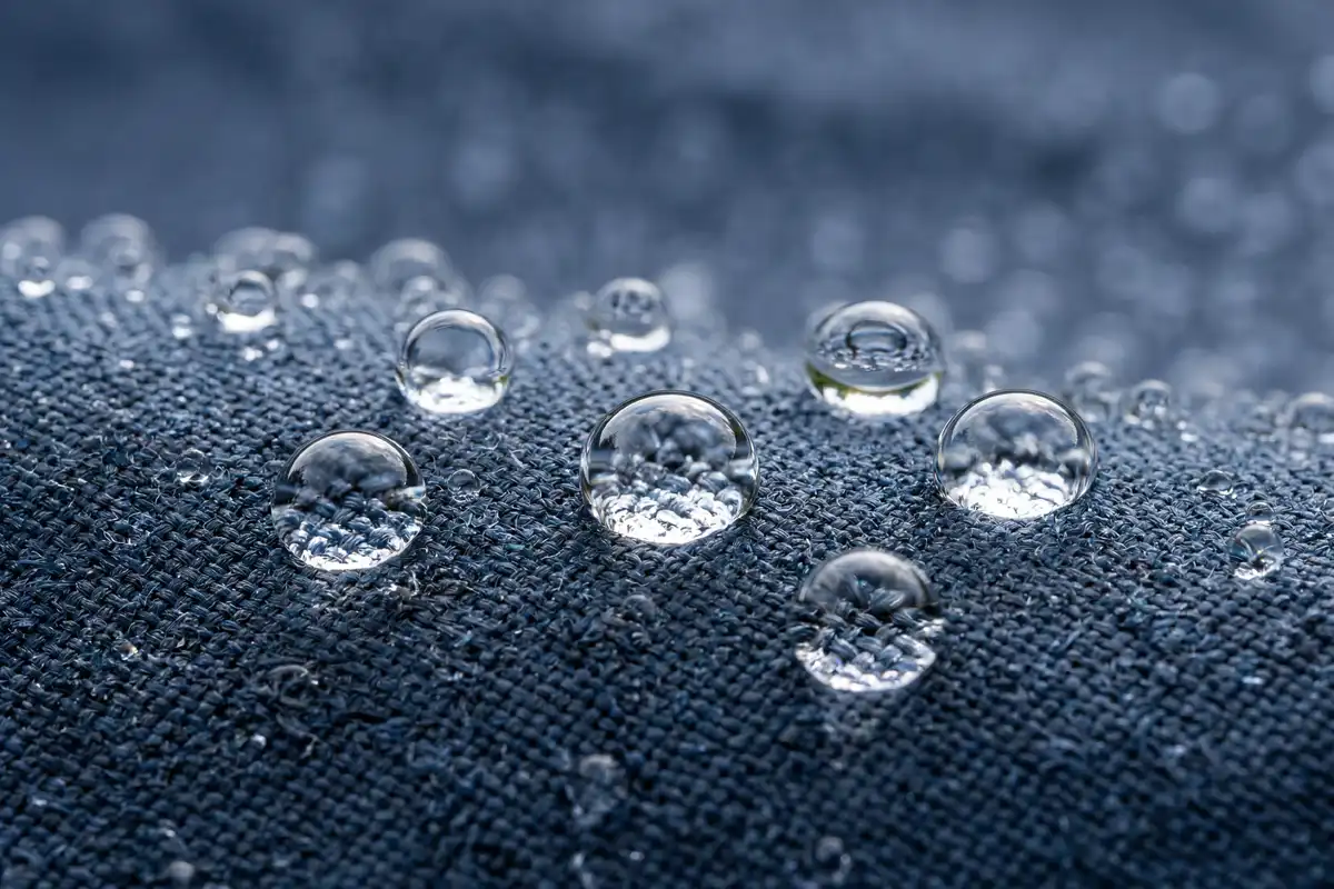 water droplets beading off a treated tent fly fabric surface