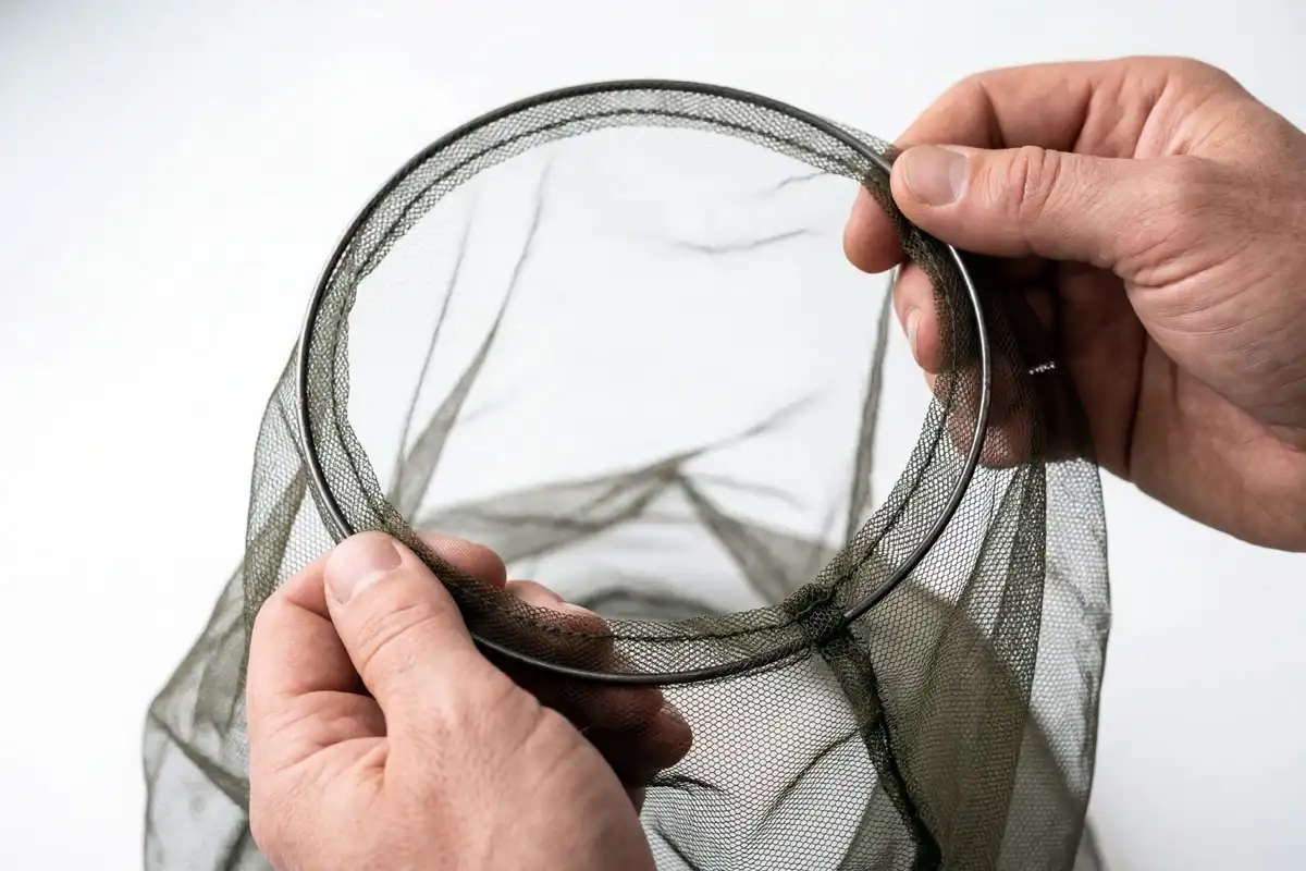 Wire frame hoop inside bug head net keeping mesh open