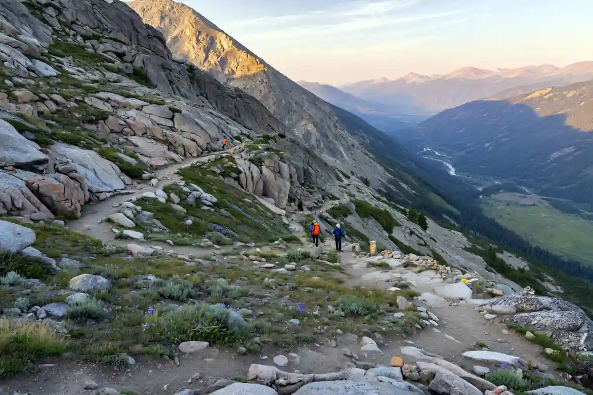 Steep mountain trail with switchbacks showing elevation gain