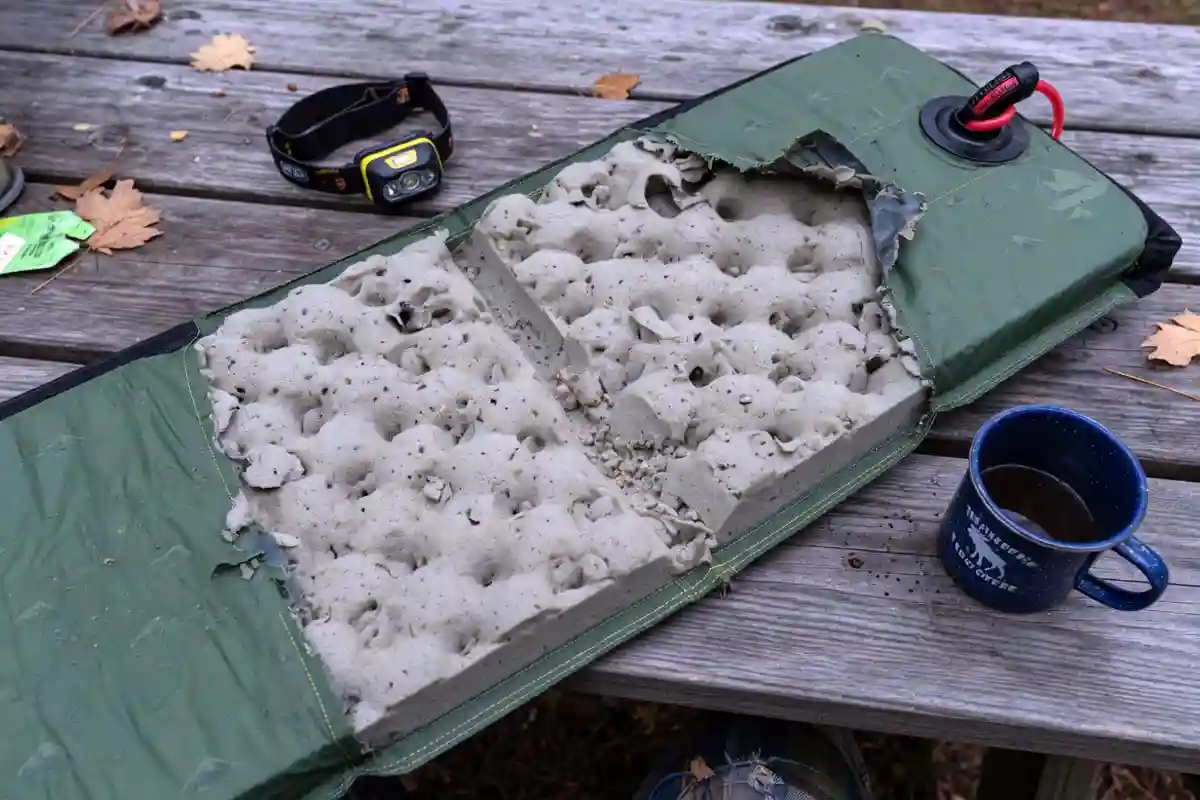 Open-cell foam core inside a self-inflating camping pad