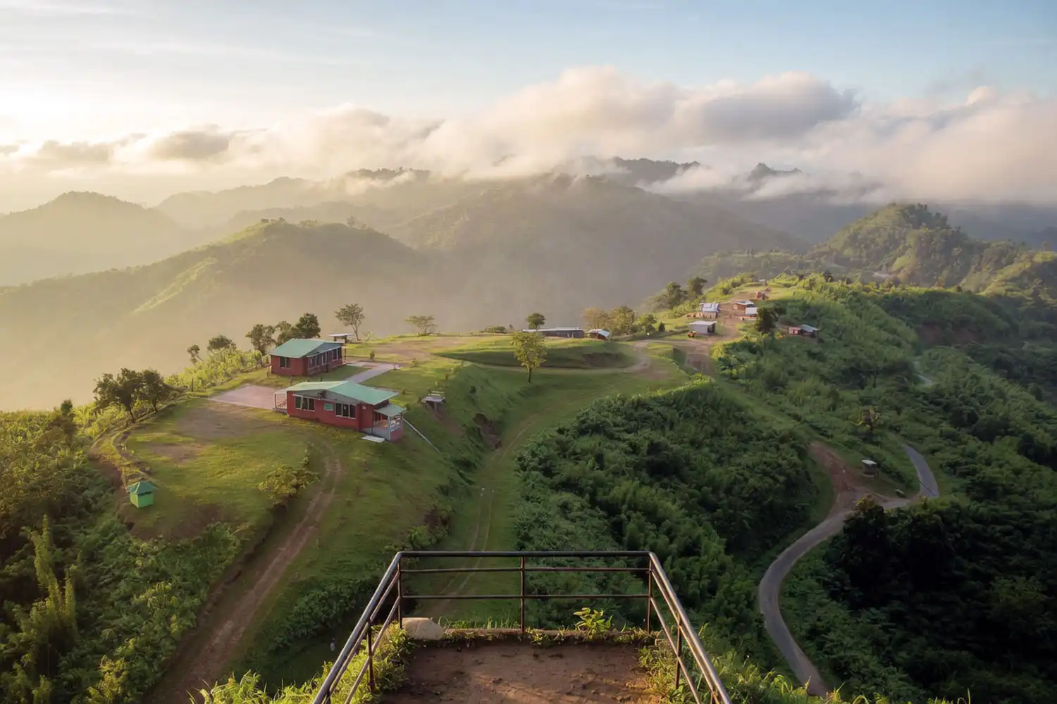 Sweeping view from Chimbuk Hill summit with low clouds