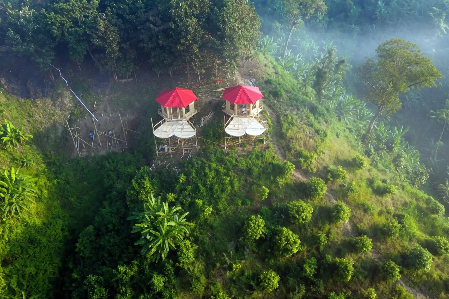 Wooden hill cottage near Thanchi Bandarban with a sunrise view over the valley