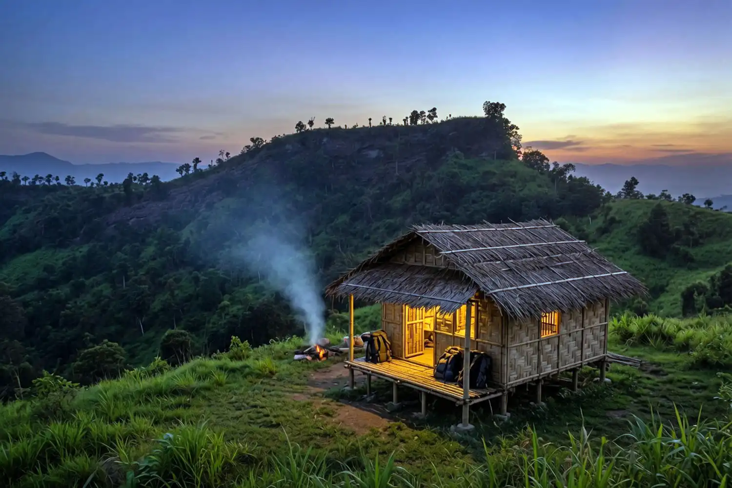 Traditional bamboo para house in a remote Bandarban hill village where trekkers stay overnight on the Saka Haphong route