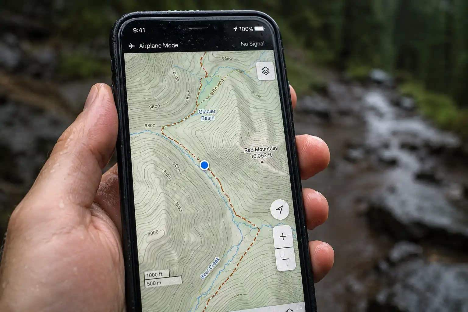 Smartphone displaying an offline topographic hiking map with the airplane mode icon visible in the status bar and rain drops across the screen