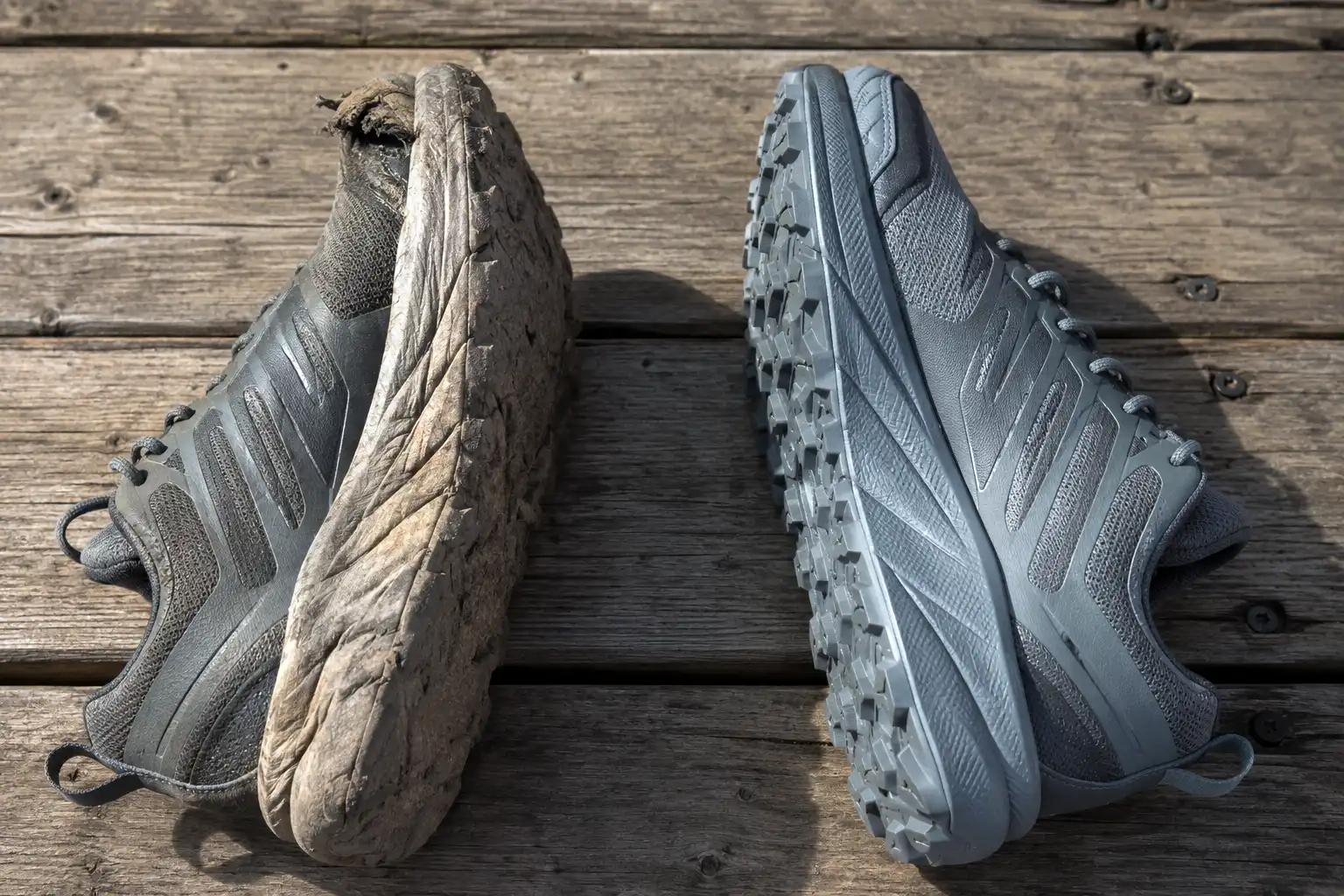 Side by side comparison of a worn trail shoe with flattened midsole and rounded lugs next to a new shoe with deep tread